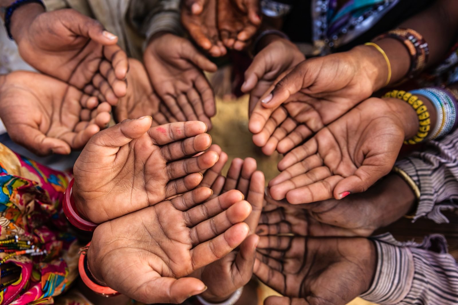 Many hands from the communities we work with