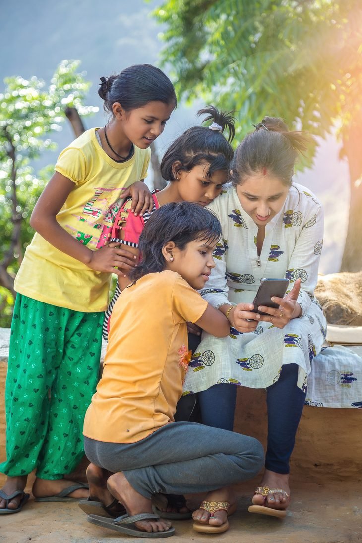 Volunteering at slums and government schools