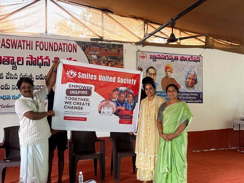 Handing over the donated kits